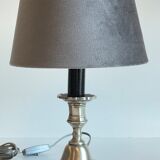 Steel candlestick lamp and grey velvet