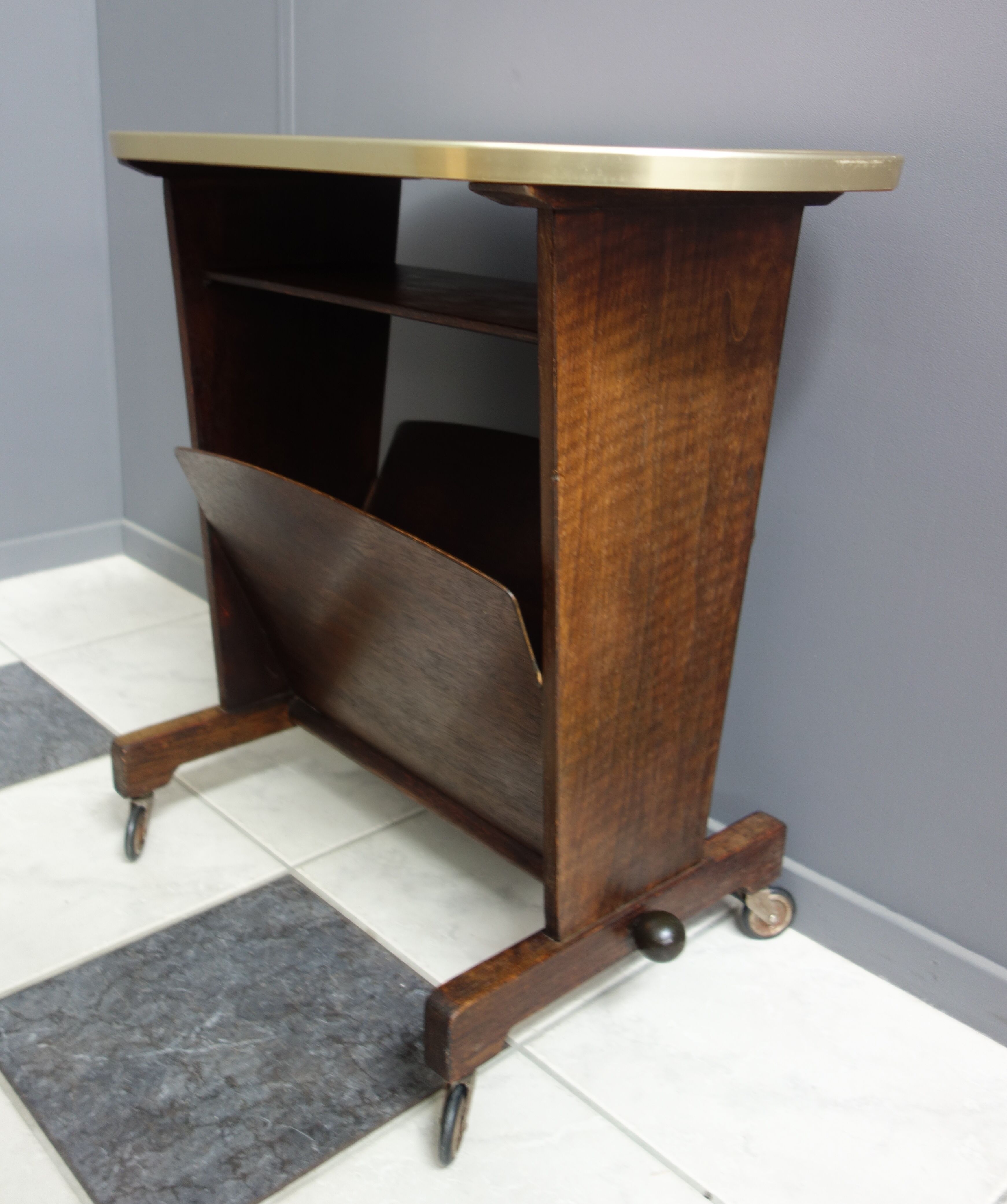 Pink formica magazine table 1950s