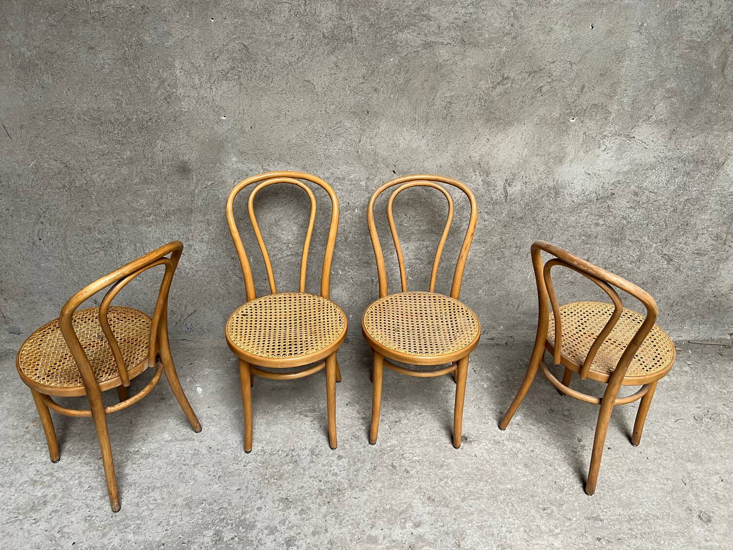 Set of 4 vintage bistro chairs in curved wood and cane seats 1950 1960