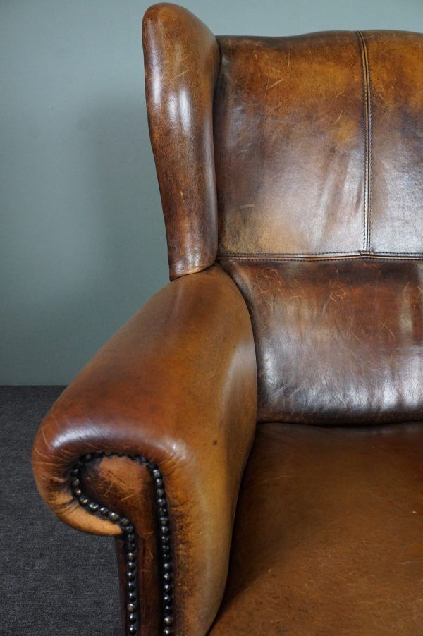 Armchair + sheepskin pouf