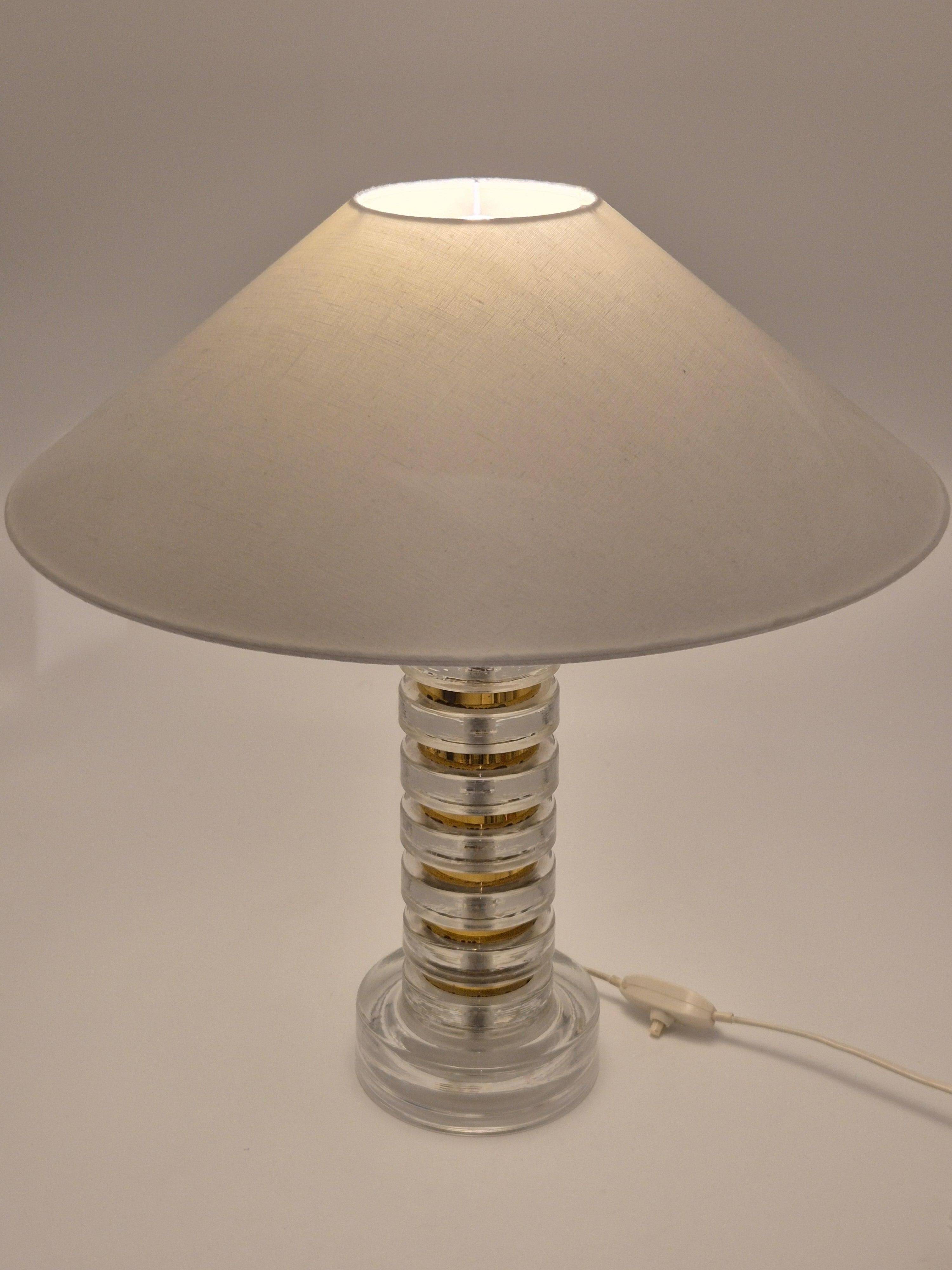 The Modern Scandinavian / Midcentury Modern table lamp with Orrefors glass and brass.