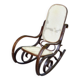 Rocking-chair vintage en bois massif courbé et cannée