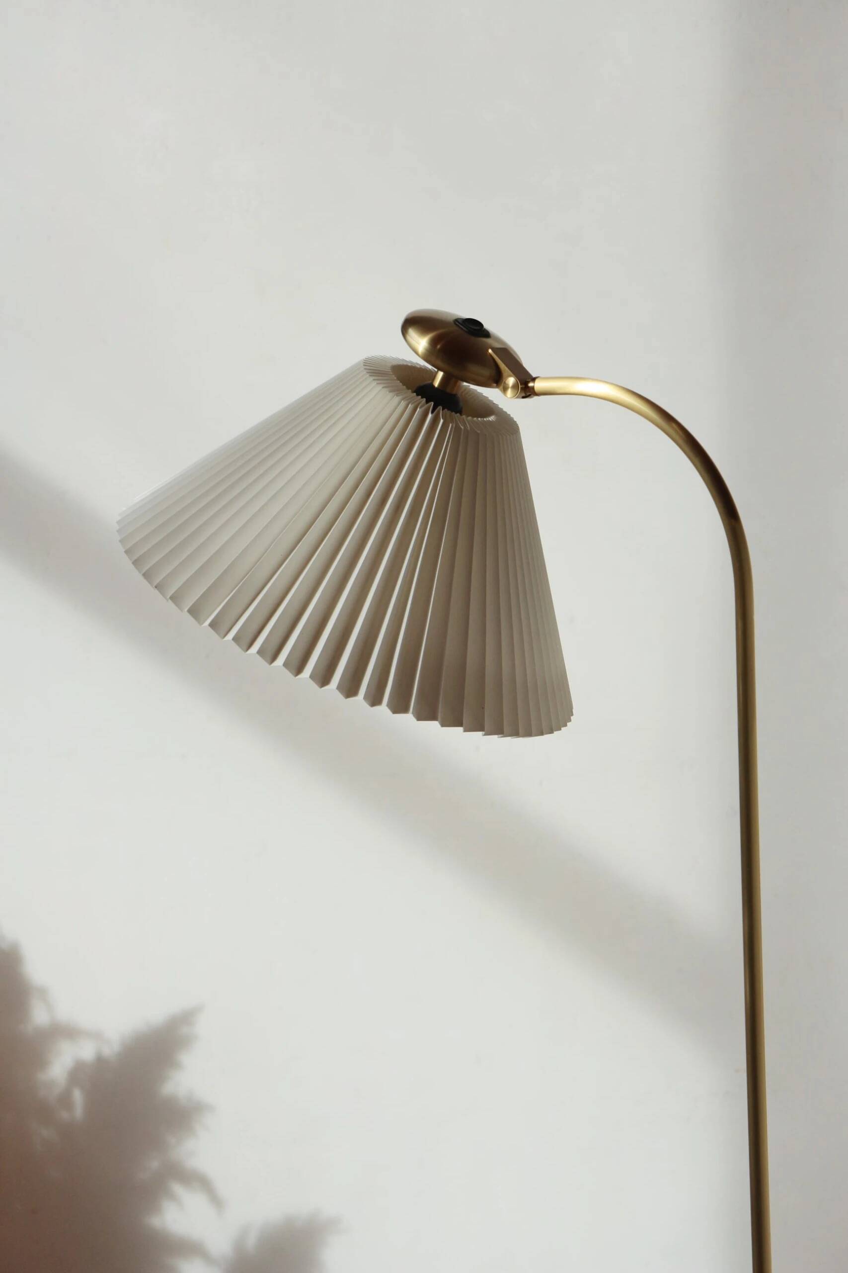 Le Klint 340 floor lamp in brass – design by Philip Bro Ludvigsen