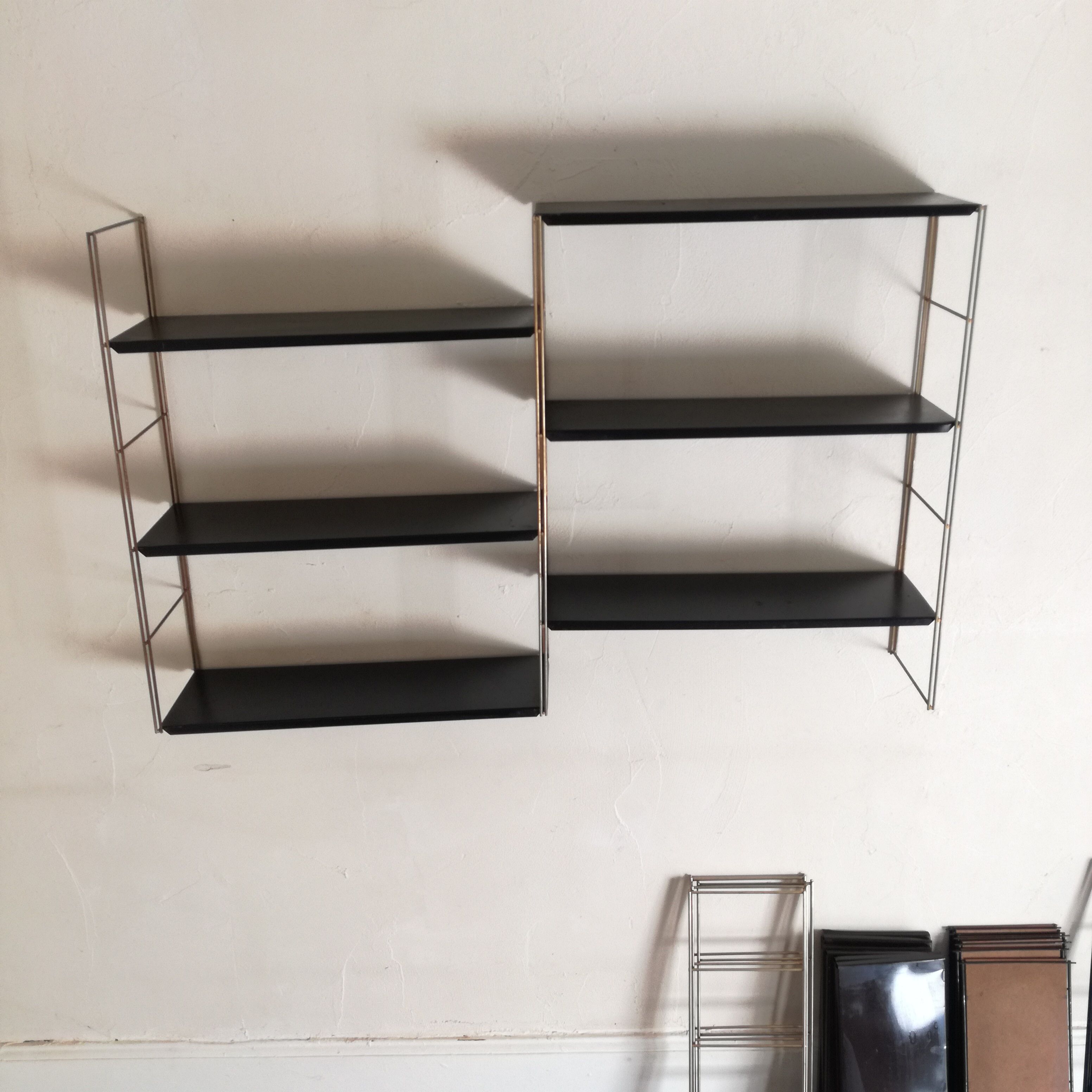 Gold and black String shelf