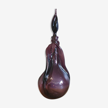 Purple decanter made of blown glass
