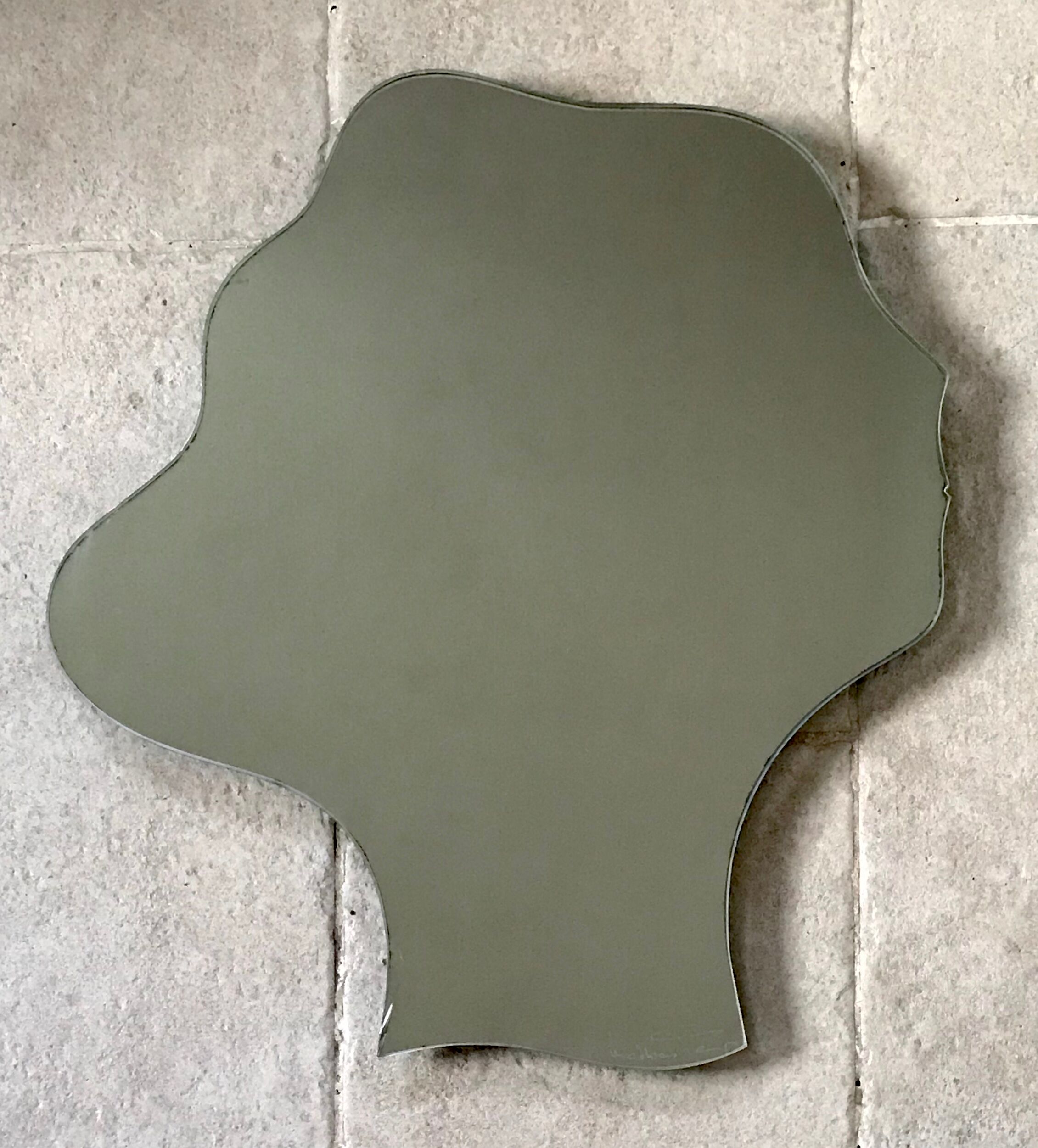 Free-form mirror signed Mathias 55x59cm