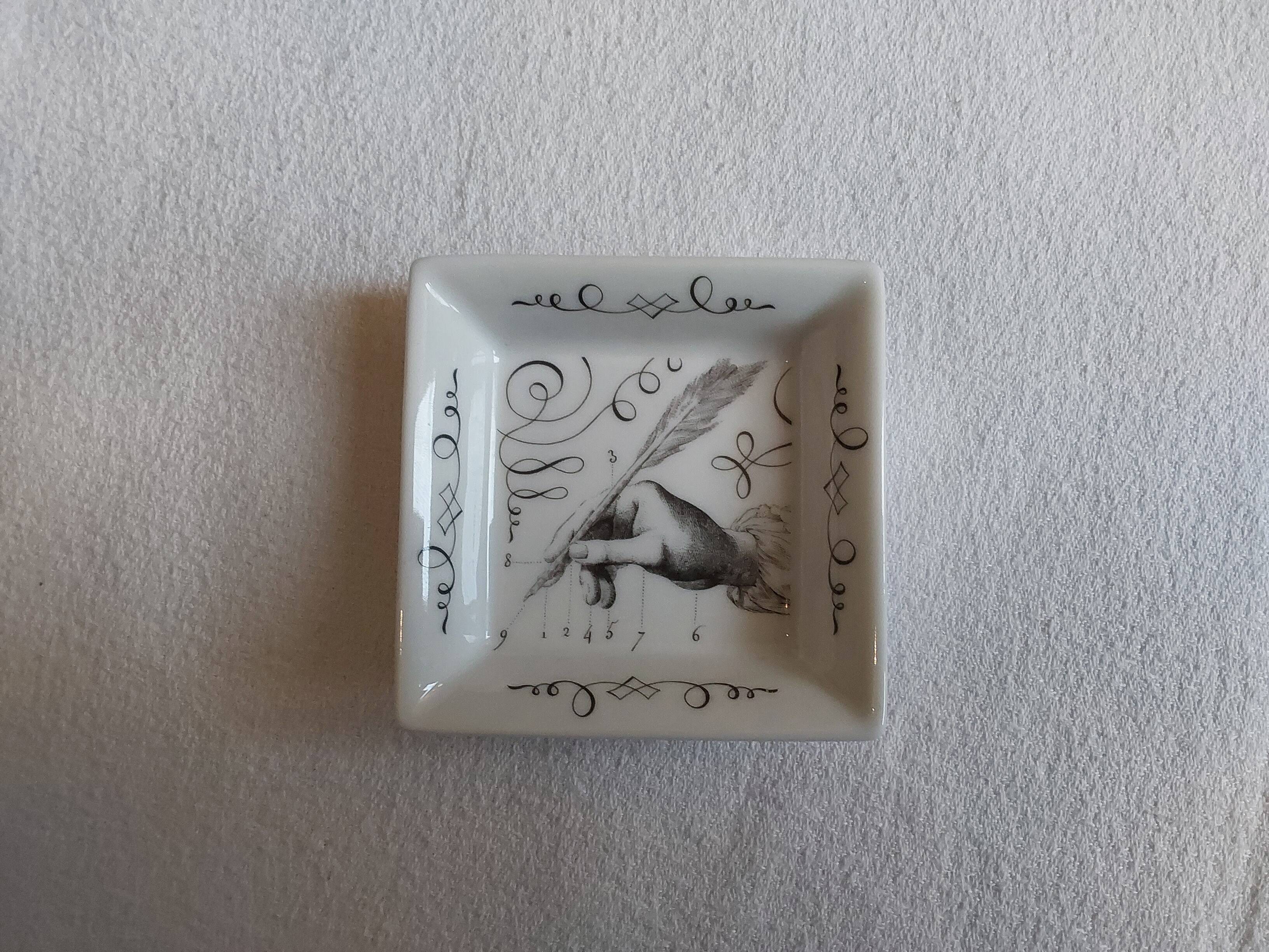 Mini Hermès pocket emptier