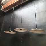 Suspensions in enamelled sheets