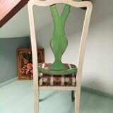 Chair with lyre backrest