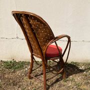 Vintage 1970s armchair in curved woven chestnut + seat cushion