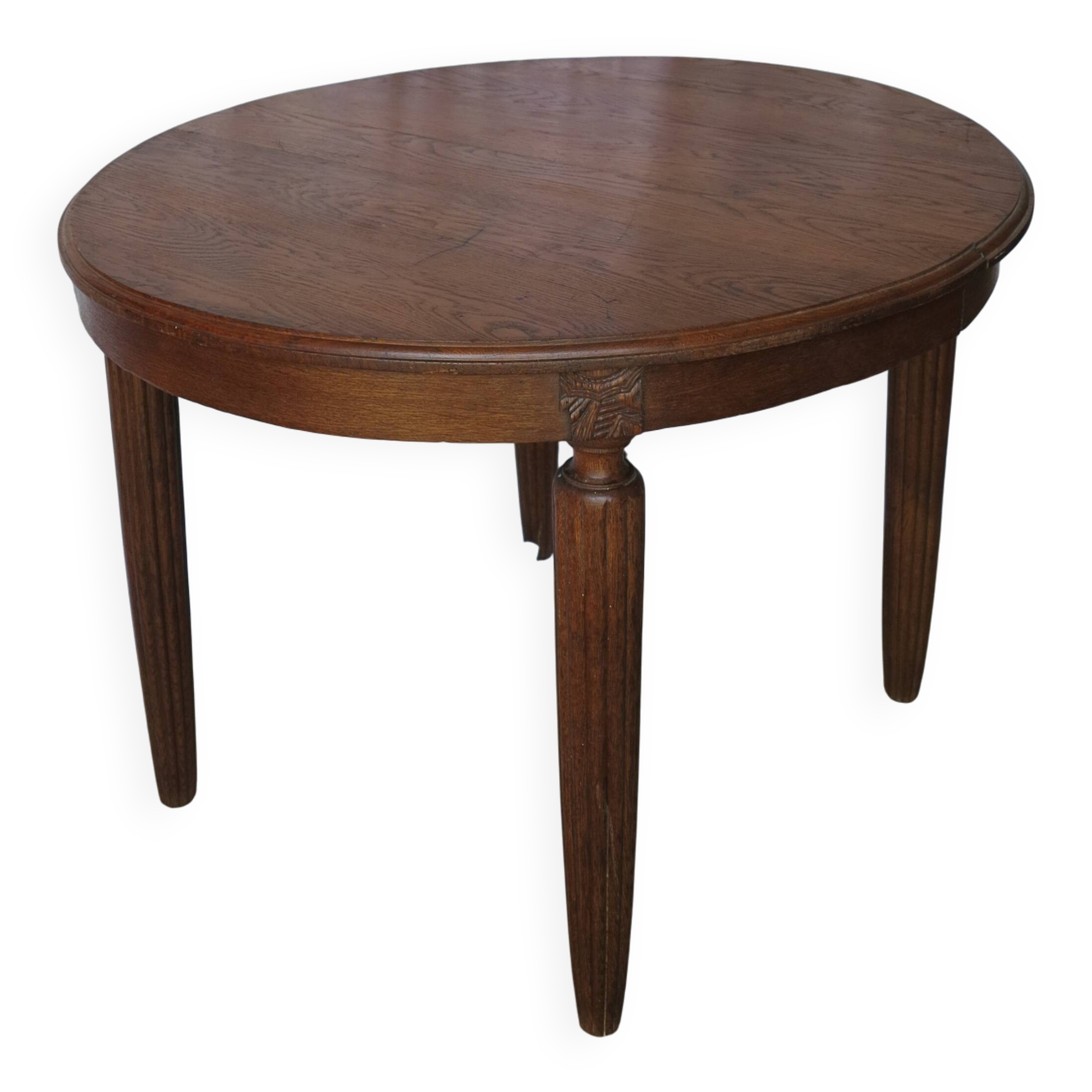 1930s oak dining table, slightly oval.