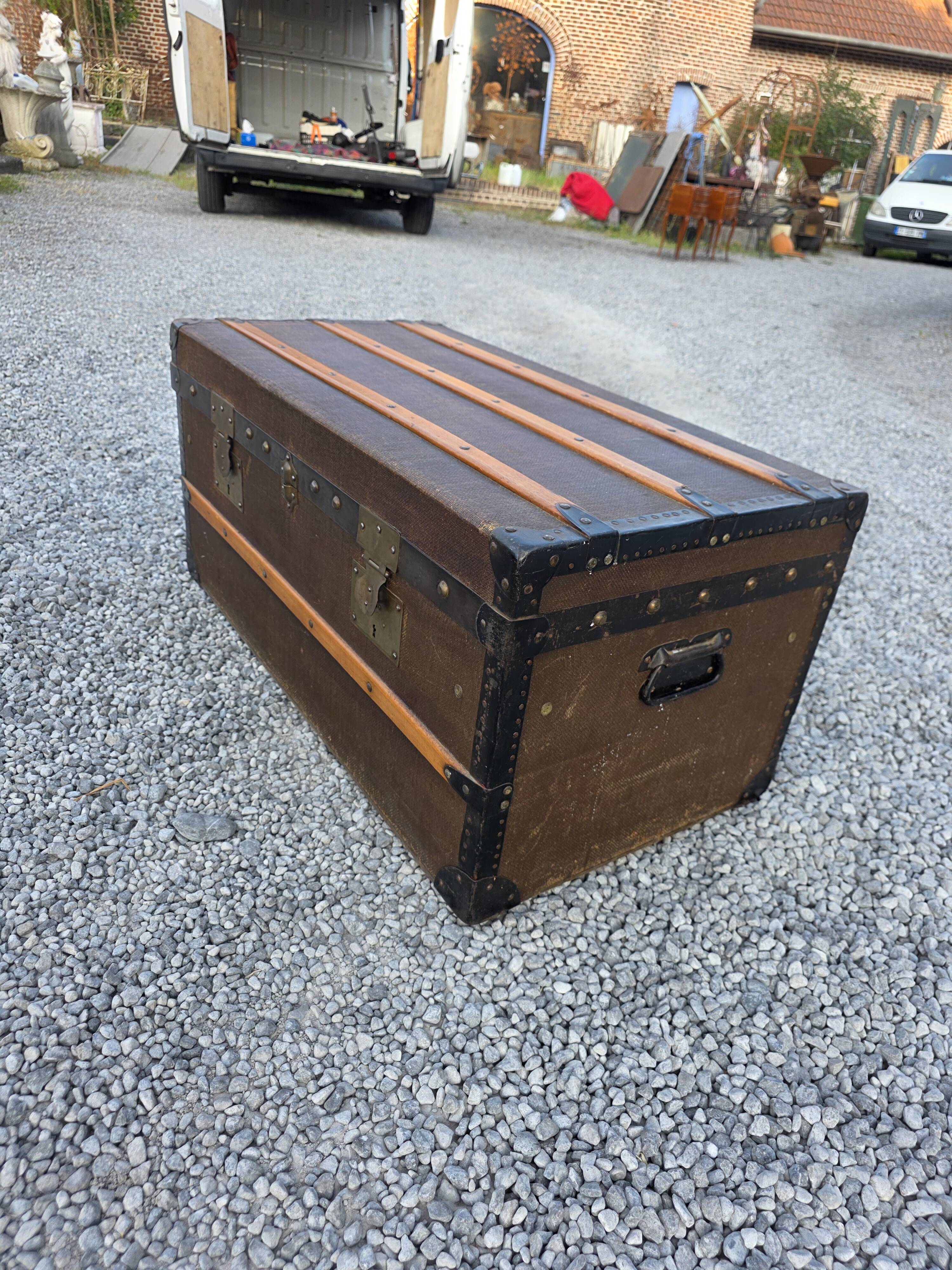 Old travel trunk in oilcloth