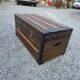 Old travel trunk in oilcloth