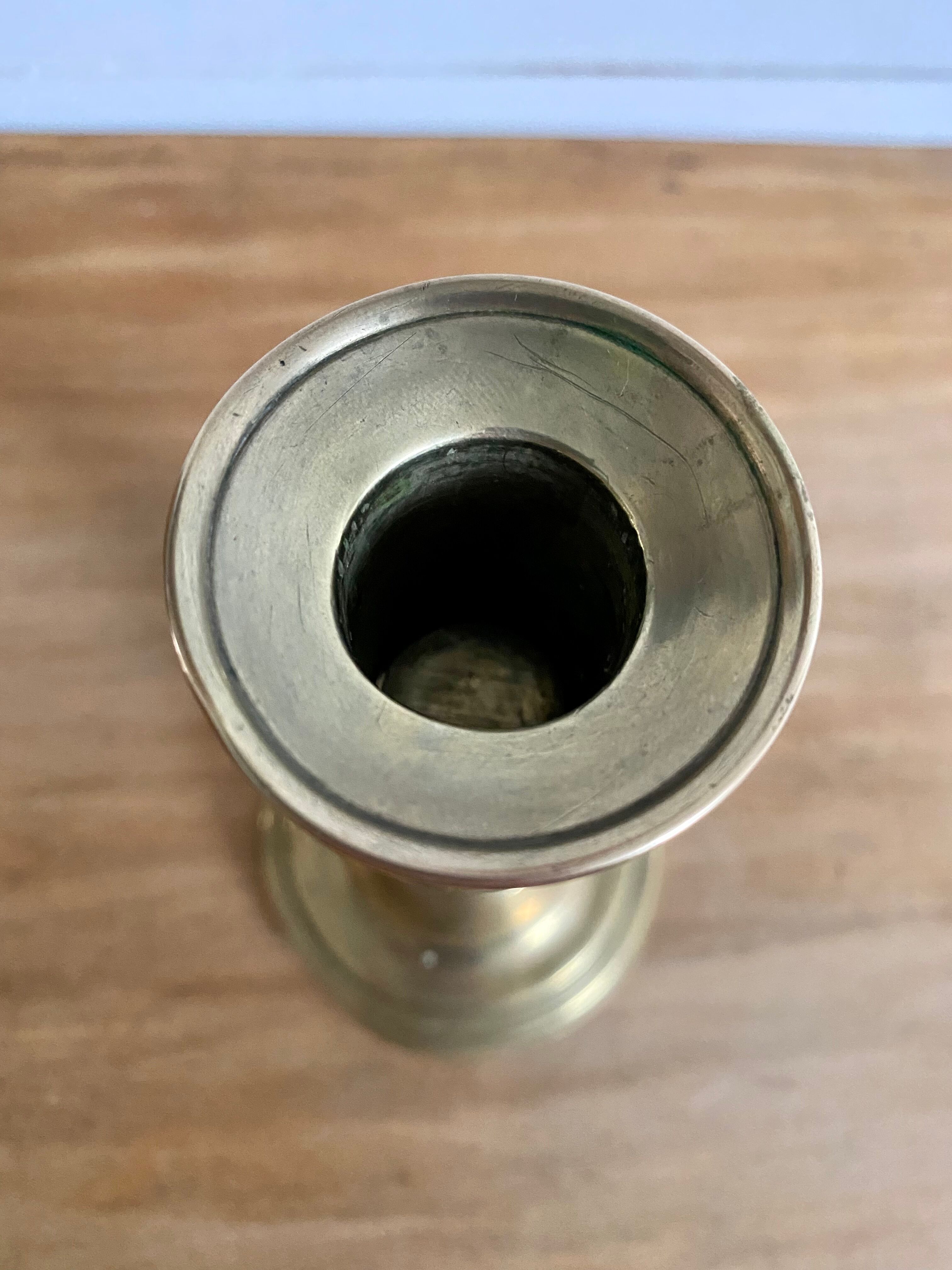 Nineteenth-century brass pull-out candle holder