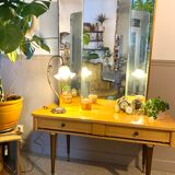 Dressing table in a vintage mirror triptych
