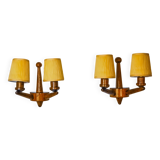 Pair of two-armed art deco "ball" wall lights, carved wood, France, 1960
