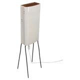 Mid-century modern floor lamp on iron legs with plastic shade and wood accent