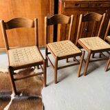 5 chairs made of wood and rope