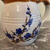 Decorated stoneware carafe