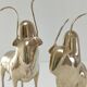 Two stylized zebu with long vintage brass horns