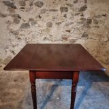 Antique English drop-leaf table in mahogany, late 19th century.