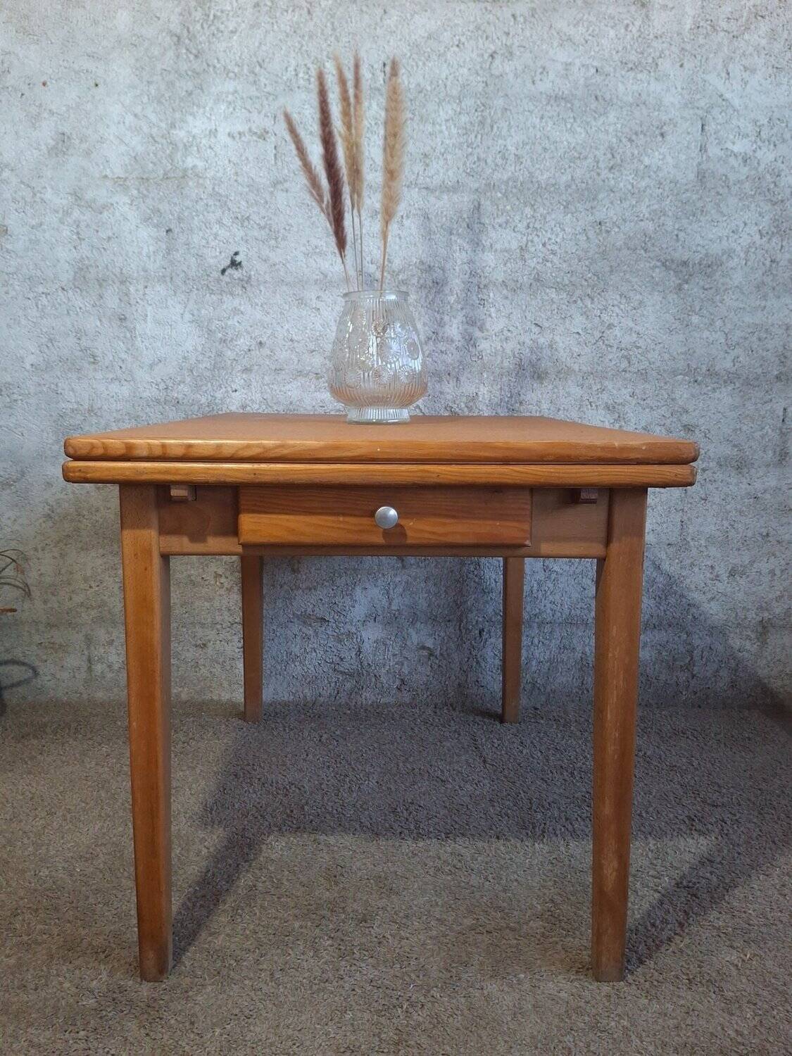 1950s dining table with sliding extensions