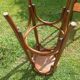 curved wooden bar stool