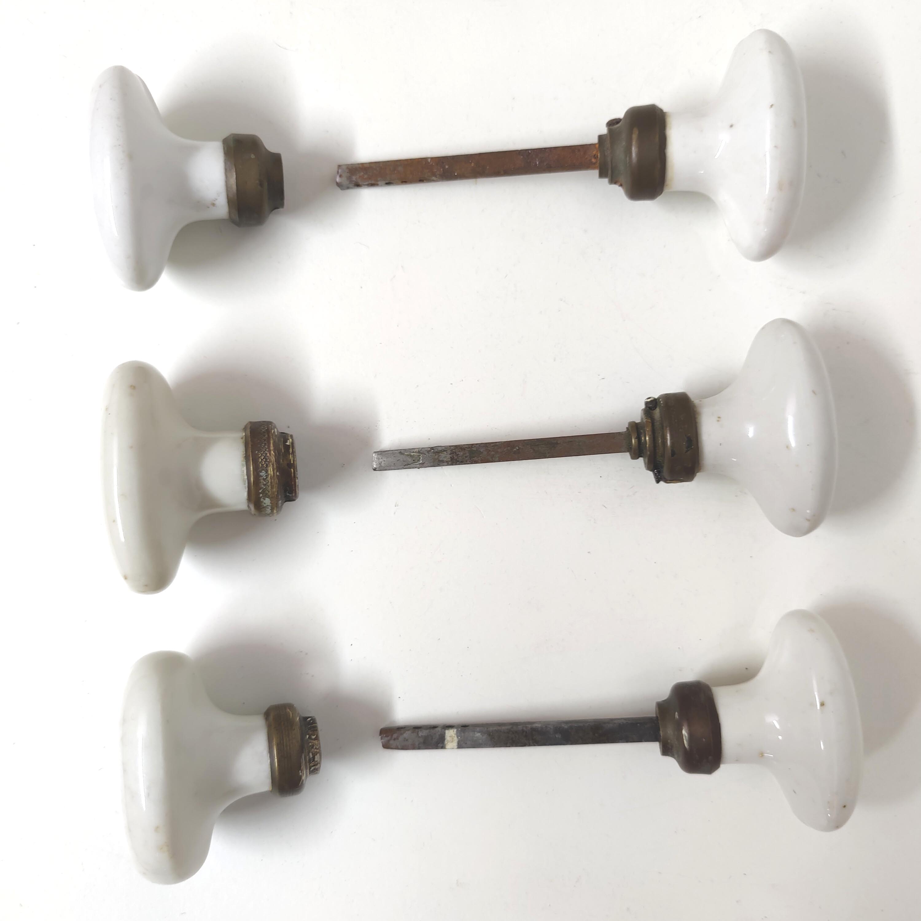 Set of 3 white porcelain button door handles