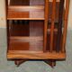 Sheraton-style rotating library table in walnut and satinwood.
