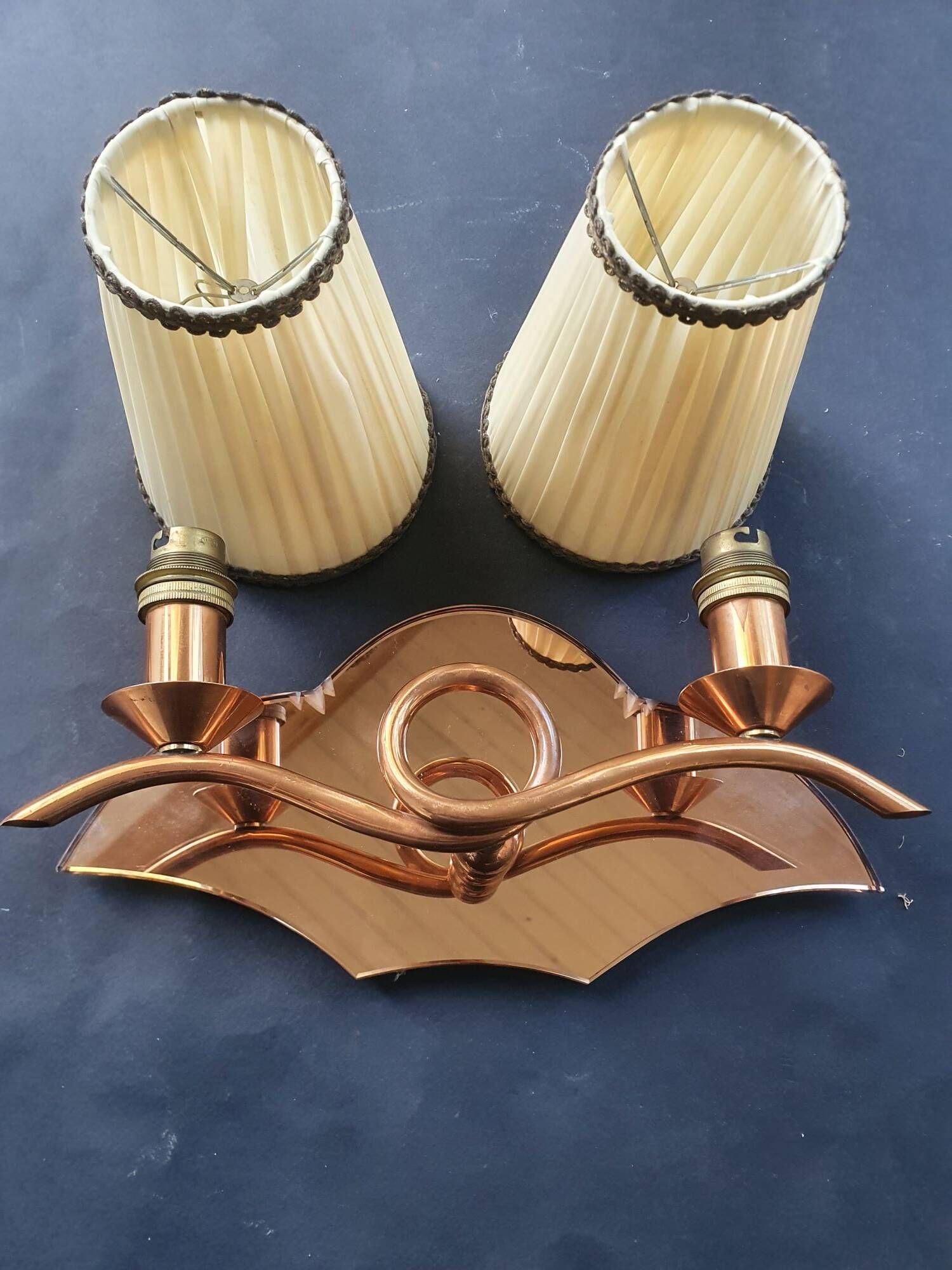 Copper wall lamp with 1940s Art Deco shades.