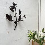 Wall lamp in wrought iron.