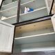 Display cabinet in patinated wood
