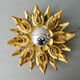 Applique forme fleur, en bois sculpté doré et verre, années 70