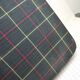 Green scottish fabric case with key