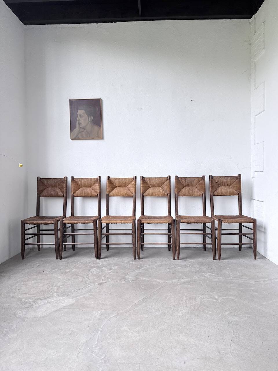 Set of 6 straw and oak Beauche chairs.