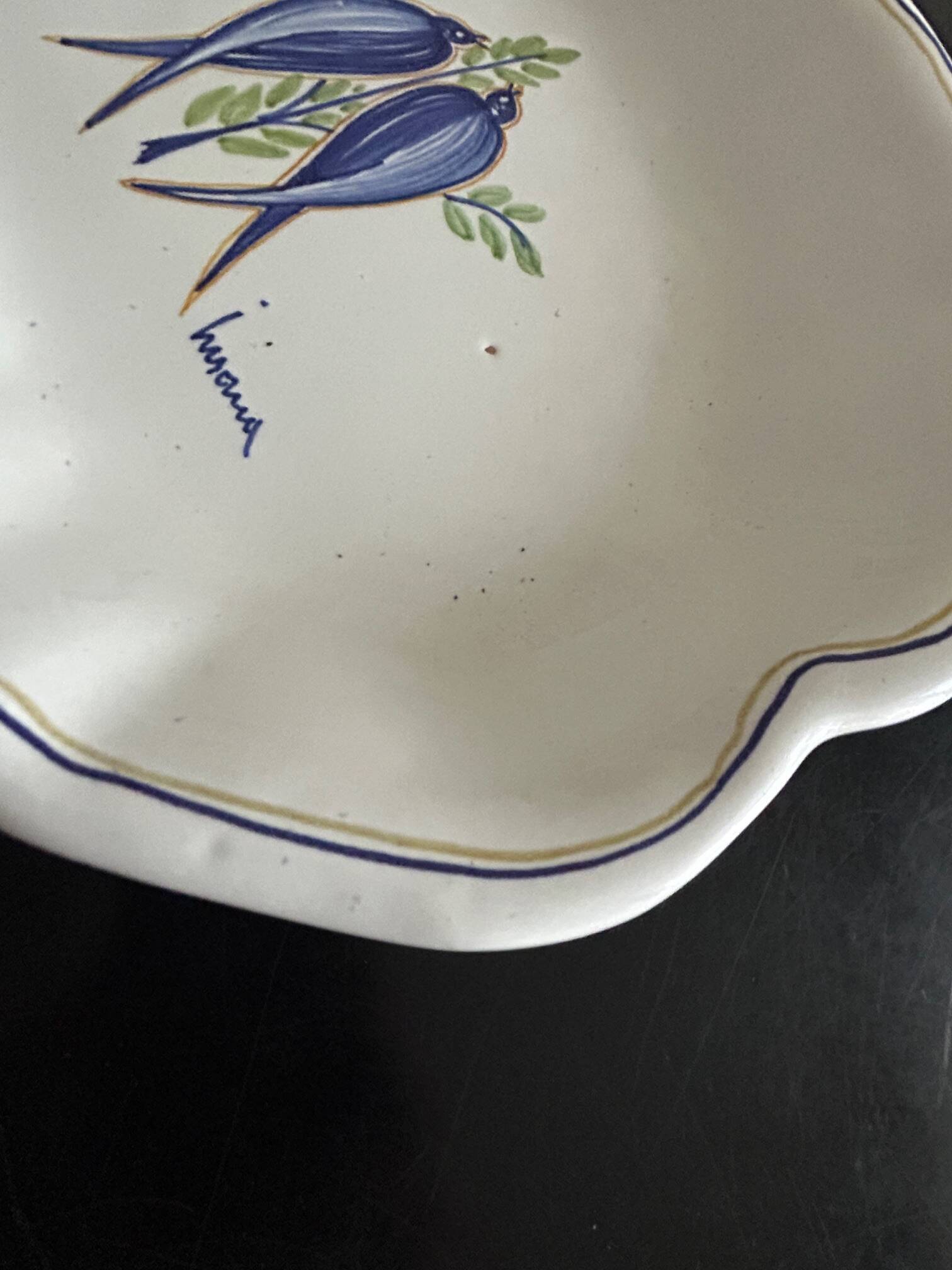 vintage plate in earthenware with birds