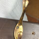 Wooden coat rack with double brass hooks
