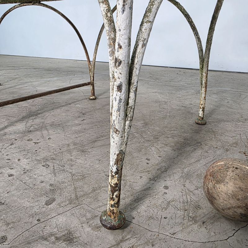 Beautiful curved garden bench from the late 19th century in iron.