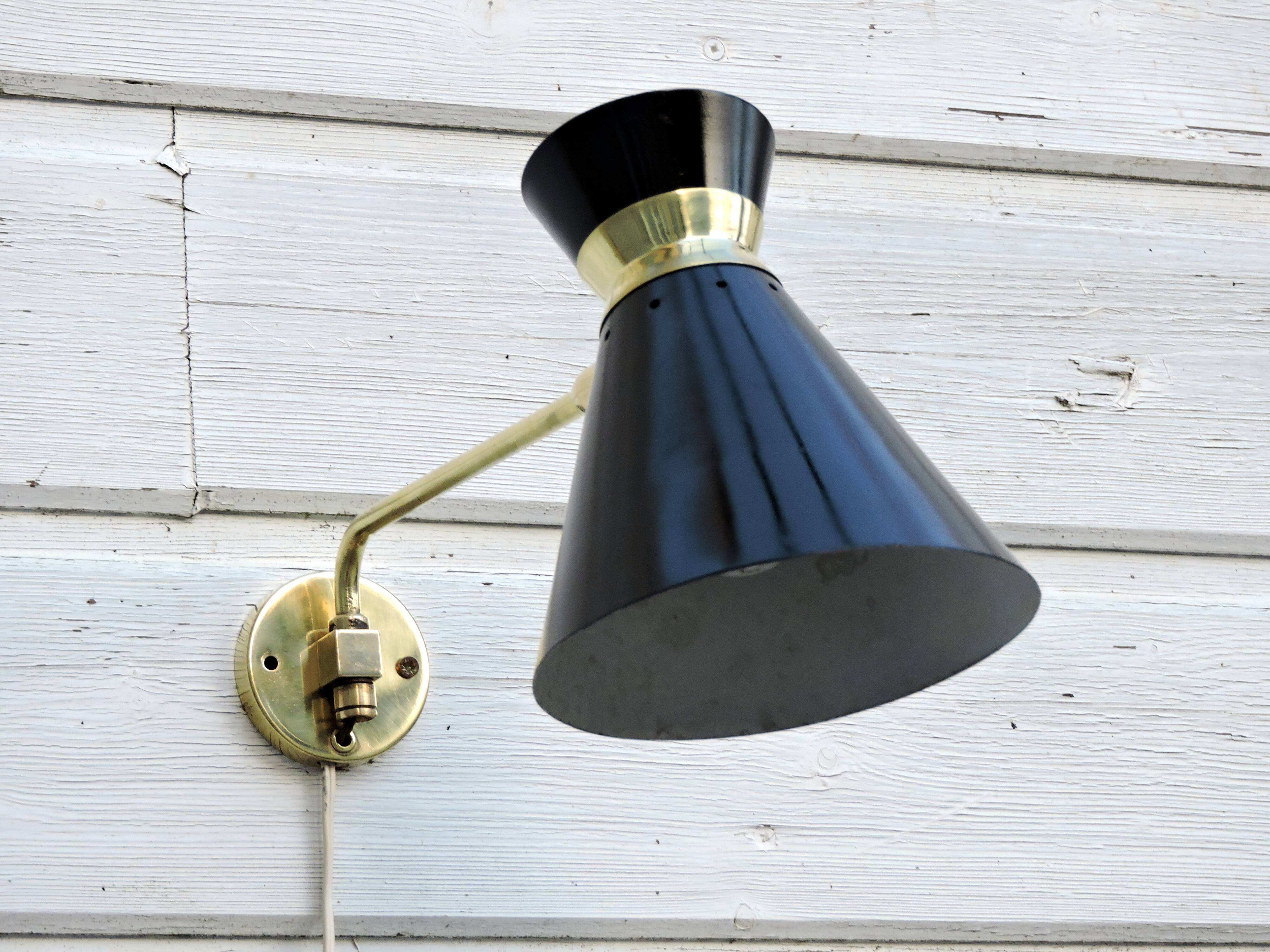 Adjustable stem wall lamp with ball head, diabolo lampshade