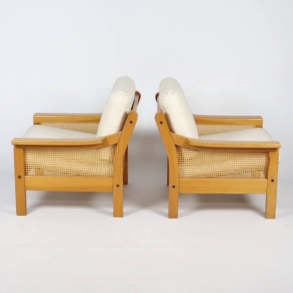 Pair of 70s cane and pine armchairs