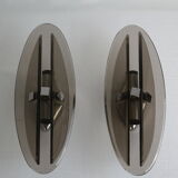 Pair of smoked glass and vintage chrome wall lamps