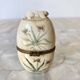 Ivory and brass owl and ermine box