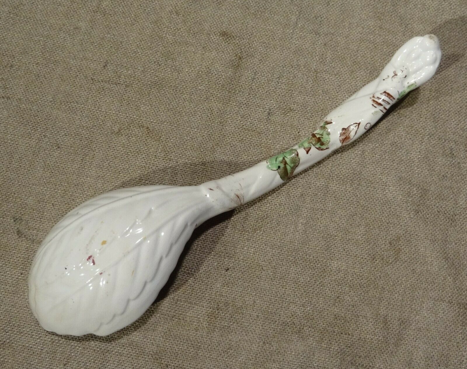 Old spoon with earthenware sauce with floral decoration Longchamp Sarreguemines