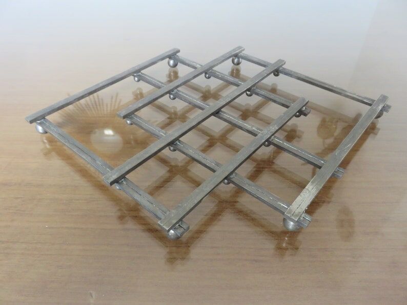 Extendable silver metal underside 40s 50s