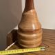 Vintage lamp with a carved wooden base from the 1970s.
