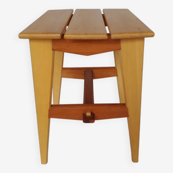 Designer wooden stool or end of sofa