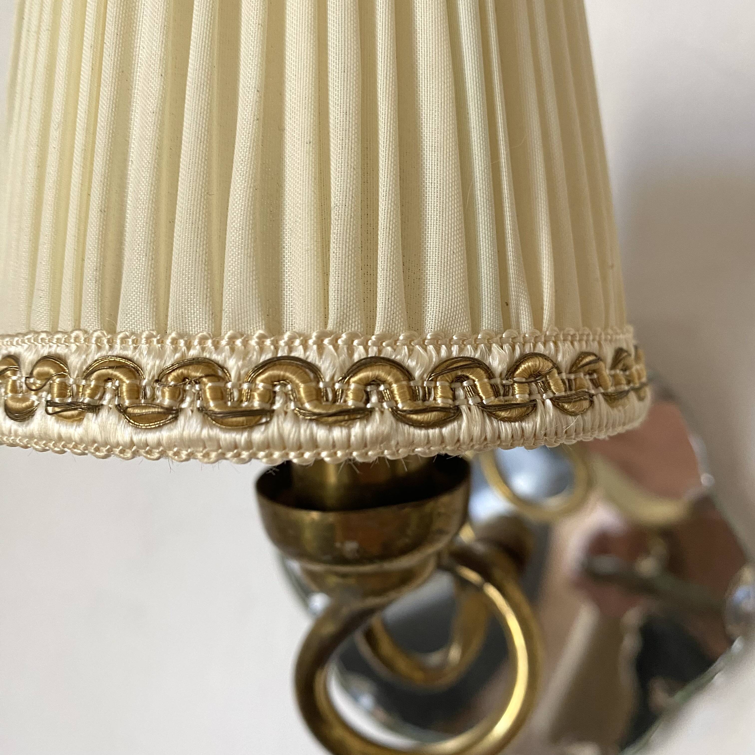 Pair of mirror and brass wall lights from the 50s and 60s