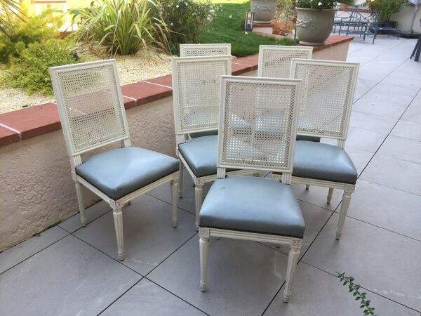 6 chaises de style Louis XVI à dossier canné et assise de cuir