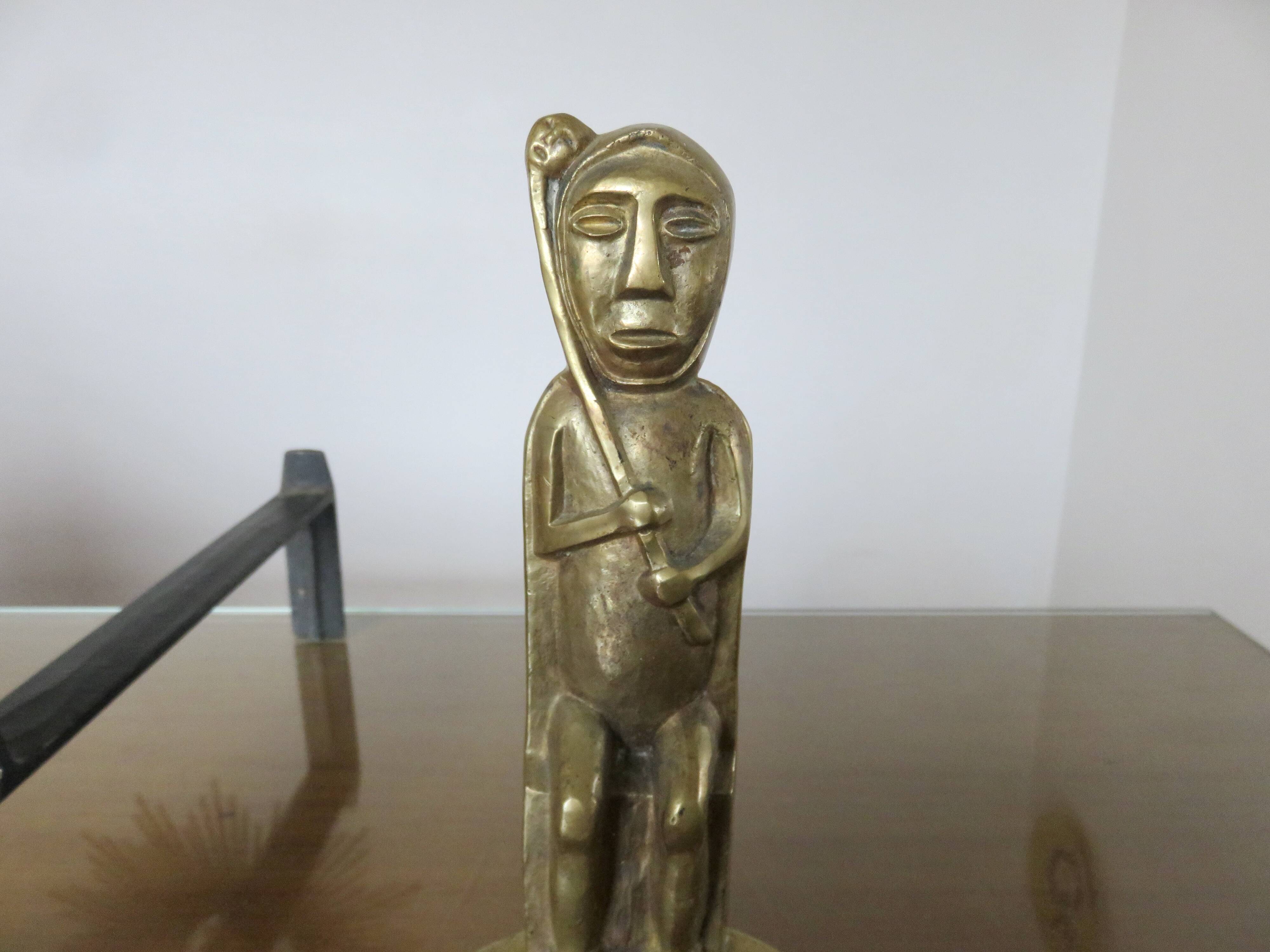 Anton Prinner, pair of Shaman fire dogs in gilded bronze, monogrammed, 1930