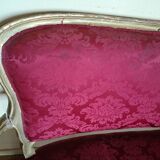 Louis XV style sofa in gilded wood and red pompadour fabric